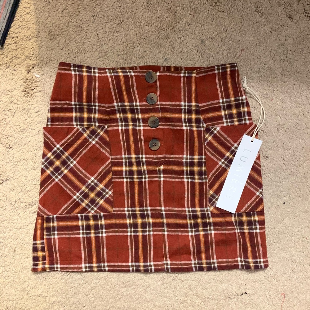 Plaid button up mini skirt
